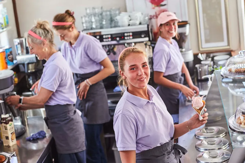 Staff member with an ice cream cone